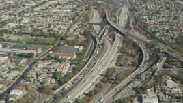 4.8K aerial stock footage of heavy traffic on the East Los Angeles Interchange in Boyle Heights, Los Angeles, California Aerial Stock Footage | AX68_028