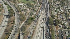 4.8K aerial stock footage fly over heavy traffic on Interstate 5 through Boyle Heights, Los Angeles, California Aerial Stock Footage | AX68_030
