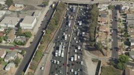 4.8K aerial stock footage bird's eye view of heavy traffic on Interstate 5 in Boyle Heights, Los Angeles, California Aerial Stock Footage | AX68_031