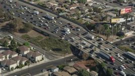 4.8K aerial stock footage flyby heavy freeway traffic on Interstate 5 through Boyle Heights, Los Angeles, California Aerial Stock Footage | AX68_033