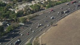 4.8K aerial stock footage of light traffic on Interstate 710 through South Gate, Los Angeles, California Aerial Stock Footage | AX68_045