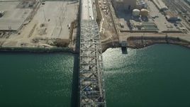 4.8K aerial stock footage fly over Gerald Desmond Bridge at the Port of Long Beach, California Aerial Stock Footage | AX68_141