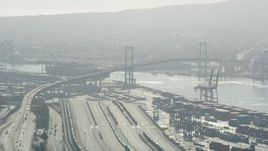 4.8K aerial stock footage of approaching the Vincent Thomas Bridge at the Port of Los Angeles, California Aerial Stock Footage | AX68_145