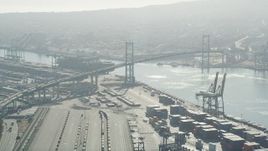 4.8K aerial stock footage approach the Vincent Thomas Bridge with light traffic at Port of Los Angeles, California Aerial Stock Footage | AX68_146