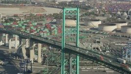4.8K aerial stock footage of Vincent Thomas Bridge and light traffic at the Port of Los Angeles, California Aerial Stock Footage | AX68_153