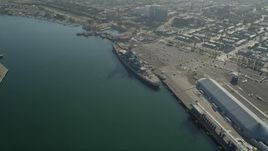 4.8K aerial stock footage approach Battleship USS Iowa at the Port of Los Angeles, California Aerial Stock Footage | AX68_158