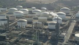 4.8K aerial stock footage flyby tanks at the Los Angeles Refinery Wilmington Plant in San Pedro, California Aerial Stock Footage | AX68_173