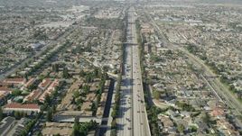 4.8K aerial stock footage fly over light traffic on I-110 through suburbs in Carson, California Aerial Stock Footage | AX68_176