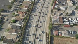 4.8K aerial stock footage of a bird's eye view of light traffic on a bend in I-110 in Carson, California Aerial Stock Footage | AX68_179