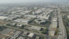 4.8K aerial stock footage of office buildings and several warehouses by I-110 in Torrance, California Aerial Stock Footage | AX68_181