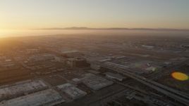 4.8K aerial stock footage of sunset at the Los Angeles International Airport in California Aerial Stock Footage | AX69_003