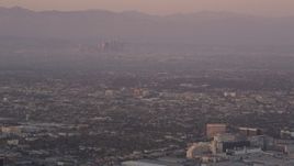 4.8K aerial stock footage track airliner on approach to LAX at sunset, Los Angeles, California Aerial Stock Footage | AX69_015