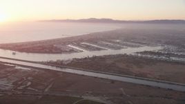 4.8K aerial stock footage of sunset at Marina Del Rey coastal neighborhoods, California Aerial Stock Footage | AX69_019