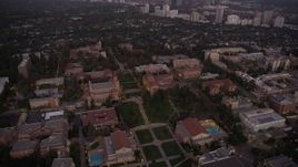 4.8K aerial stock footage fly over Wilson Plaza, Dickson Court, and College campus buildings at twilight, Westwood, California Aerial Stock Footage | AX69_058