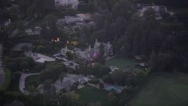 4.8K aerial stock footage of orbiting the Playboy Mansion in Los Angeles, California, twilight Aerial Stock Footage | AX69_062