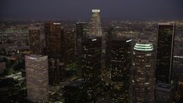 4.8K aerial stock footage approach skyscrapers at night in Downtown Los Angeles, California Aerial Stock Footage | AX69_081