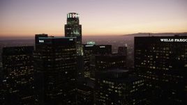 4.8K aerial stock footage approach tops of high-rises in Downtown Los Angeles at twilight, California Aerial Stock Footage | AX69_088
