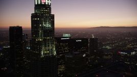 4.8K aerial stock footage fly over Downtown Los Angeles and by skyscrapers at twilight, California Aerial Stock Footage | AX69_089