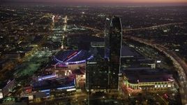 4.8K aerial stock footage of Staples Center, JW Marriott, and The Ritz-Carlton in Downtown Los Angeles, California at twilight Aerial Stock Footage | AX69_092