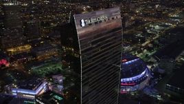 4.8K aerial stock footage of the top of the Ritz-Carlton Hotel in Downtown Los Angeles, California at twilight Aerial Stock Footage | AX69_093