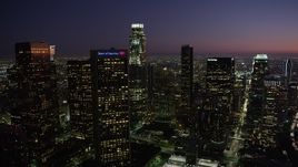 4.8K aerial stock footage of Downtown Los Angeles skyscrapers at nighttime, California Aerial Stock Footage | AX69_102