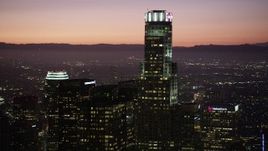 4.8K aerial stock footage top of US Bank Tower in Downtown Los Angeles, California at night Aerial Stock Footage | AX69_107