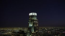 4.8K aerial stock footage orbit around US Bank Tower in Downtown Los Angeles, California at night Aerial Stock Footage | AX69_114