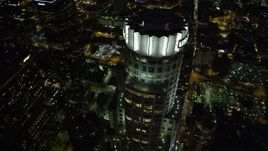 4.8K aerial stock footage bird's eye view of US Bank Tower in Downtown Los Angeles at night, California Aerial Stock Footage | AX69_119
