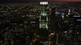4.8K aerial stock footage approach and orbit US Bank Tower in Downtown Los Angeles, California at nighttime Aerial Stock Footage | AX69_122