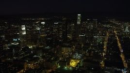 4.8K aerial stock footage of skyscrapers in Downtown Los Angeles, California at nighttime Aerial Stock Footage | AX69_128