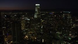 4.8K aerial stock footage of US Bank Tower and skyscrapers in Downtown Los Angeles, California at night Aerial Stock Footage | AX69_130