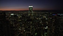 4.8K aerial stock footage orbit around US Bank Tower and Downtown Los Angeles high-rises at night, California Aerial Stock Footage | AX69_131