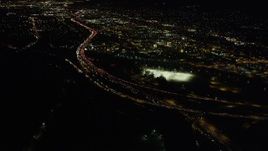 4.8K aerial stock footage of heavy traffic on the I-5 and Highway 134 Interchange in Glendale at night, California Aerial Stock Footage | AX69_139