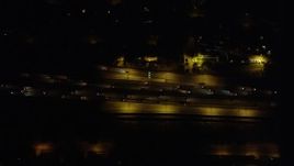 4.8K aerial stock footage of a bird's eye view of I-5 with light traffic at night in Burbank, California Aerial Stock Footage | AX69_148