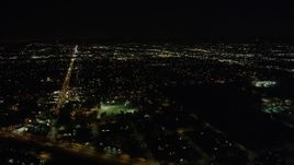 4.8K aerial stock footage of suburban neighborhoods at night in Sun Valley, California Aerial Stock Footage | AX69_150