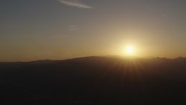 4K aerial stock footage Sunrise over the mountains Aerial Stock Footage | AX70_001