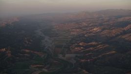 4K aerial stock footage Farm fields by the Santa Clara River at sunrise, Piru, California Aerial Stock Footage | AX70_007