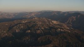 4K aerial stock footage Approach mountains at sunrise in Los Padres National Forest, California Aerial Stock Footage | AX70_011