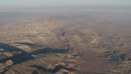 4K aerial stock footage Mountain range at sunrise, Cuyama, California Aerial Stock Footage | AX70_033