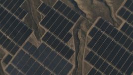 4K aerial stock footage of A bird's eye of solar panels at the Topaz Solar Farm in the Carrizo Plain, California Aerial Stock Footage | AX70_057