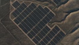 4K aerial stock footage of A bird's eye view of solar panels at Topaz Solar Farm in the Carrizo Plain, California Aerial Stock Footage | AX70_058