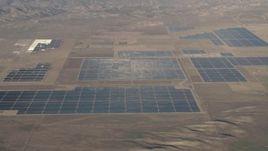 4K aerial stock footage Large panels at the Topaz Solar Farm in the Carrizo Plain, California Aerial Stock Footage | AX70_061