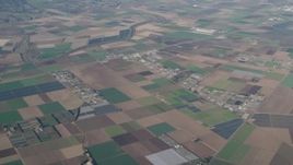 4K aerial stock footage Farms, greenhouses, and crop fields in Salinas, California Aerial Stock Footage | AX70_083