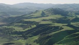 4K aerial stock footage Flyby green hills in Hollister, California Aerial Stock Footage | AX70_115