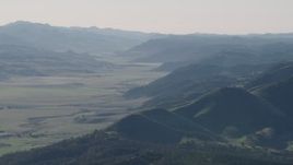 4K aerial stock footage Valley bordered by green hills in San Benito County, California Aerial Stock Footage | AX70_172