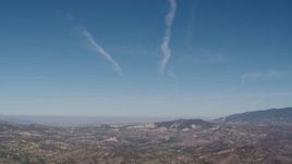 4K aerial stock footage Blue skies and sparse clouds above Los Padres National Forest, California Aerial Stock Footage | AX70_199