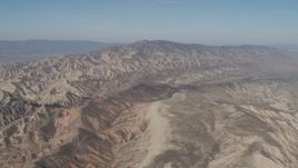 4K aerial stock footage Flyby a rugged desert mountains in the Caliente Mountain Range, California Aerial Stock Footage | AX70_203
