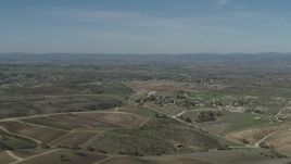 4K aerial stock footage Flyby rural homes and vineyards in Paso Robles, California Aerial Stock Footage | AX70_226