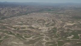 4K aerial stock footage Approaching oil fields in San Ardo, California Aerial Stock Footage | AX70_233