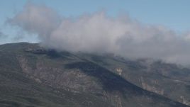 4K aerial stock footage Passing low clouds over the Santa Lucia Range, California Aerial Stock Footage | AX70_255